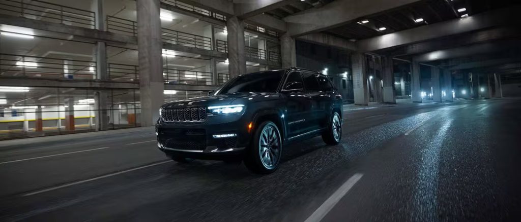 black jeep grand cherokee driving